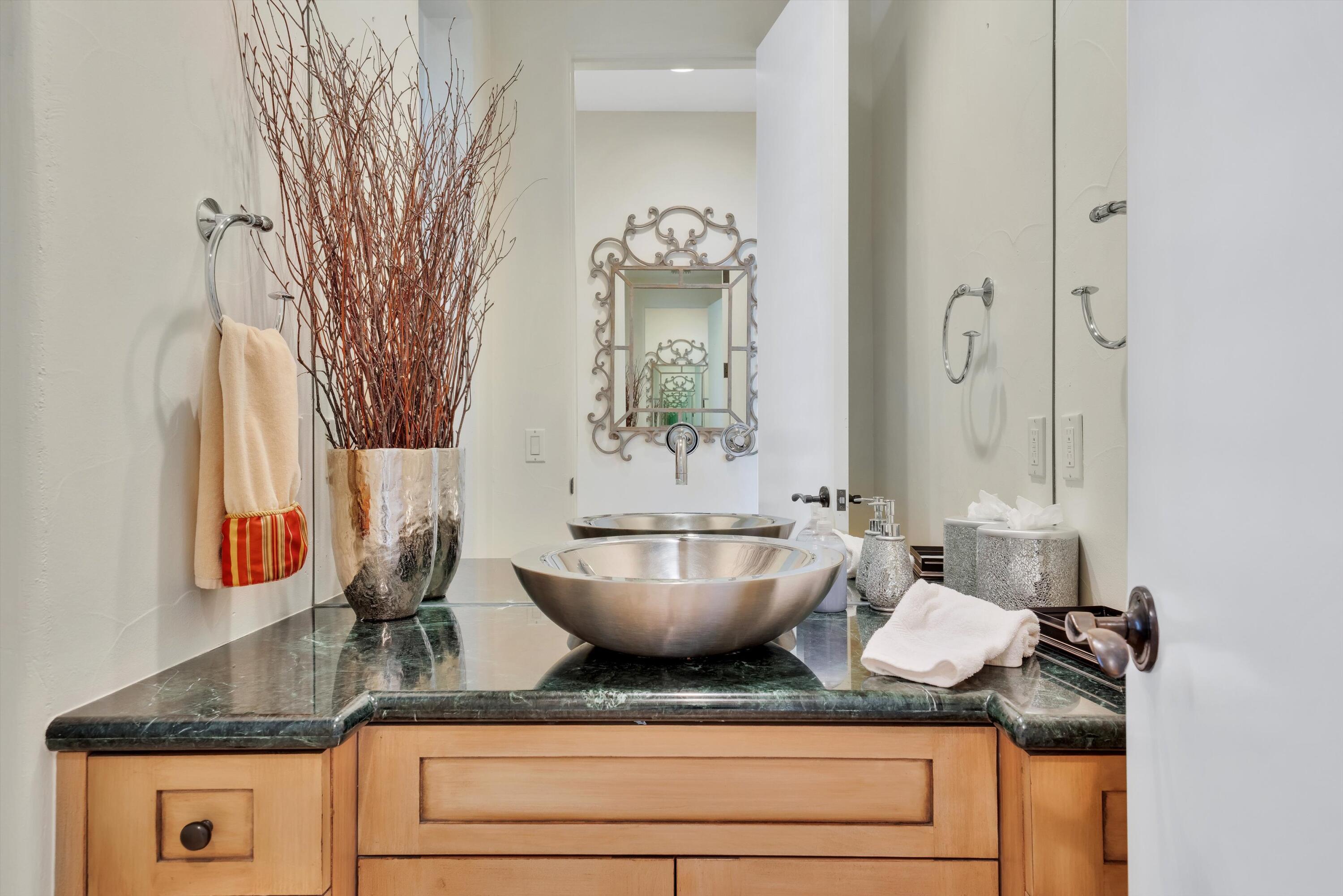 78411 Talking Rock Turn La Quinta, CA 92253 - Photo 51 of 70 a bathroom with a granite countertop sink a mirror and shower