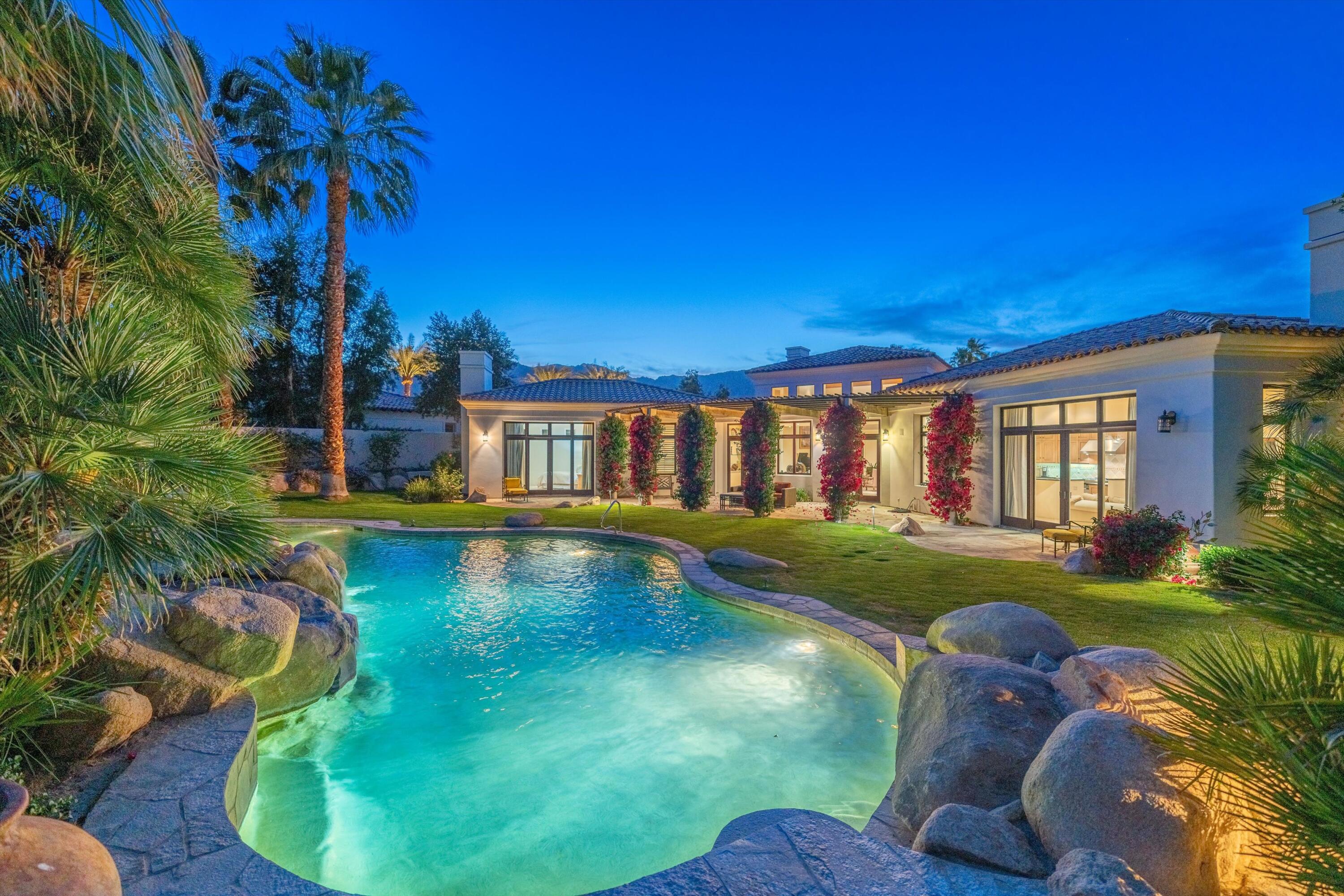 78411 Talking Rock Turn La Quinta, CA 92253 - Photo 67 of 70 a view of a house with a swimming pool and sitting area