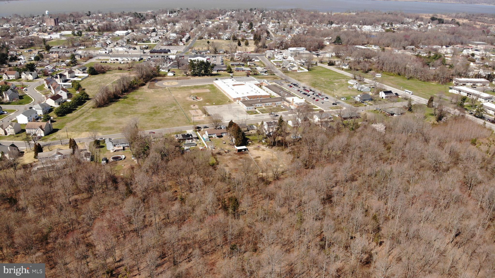 150 Penns Grove Auburn Road Carneys Point, NJ 08069 - Photo 3 of 16 an aerial view of residential houses with city view