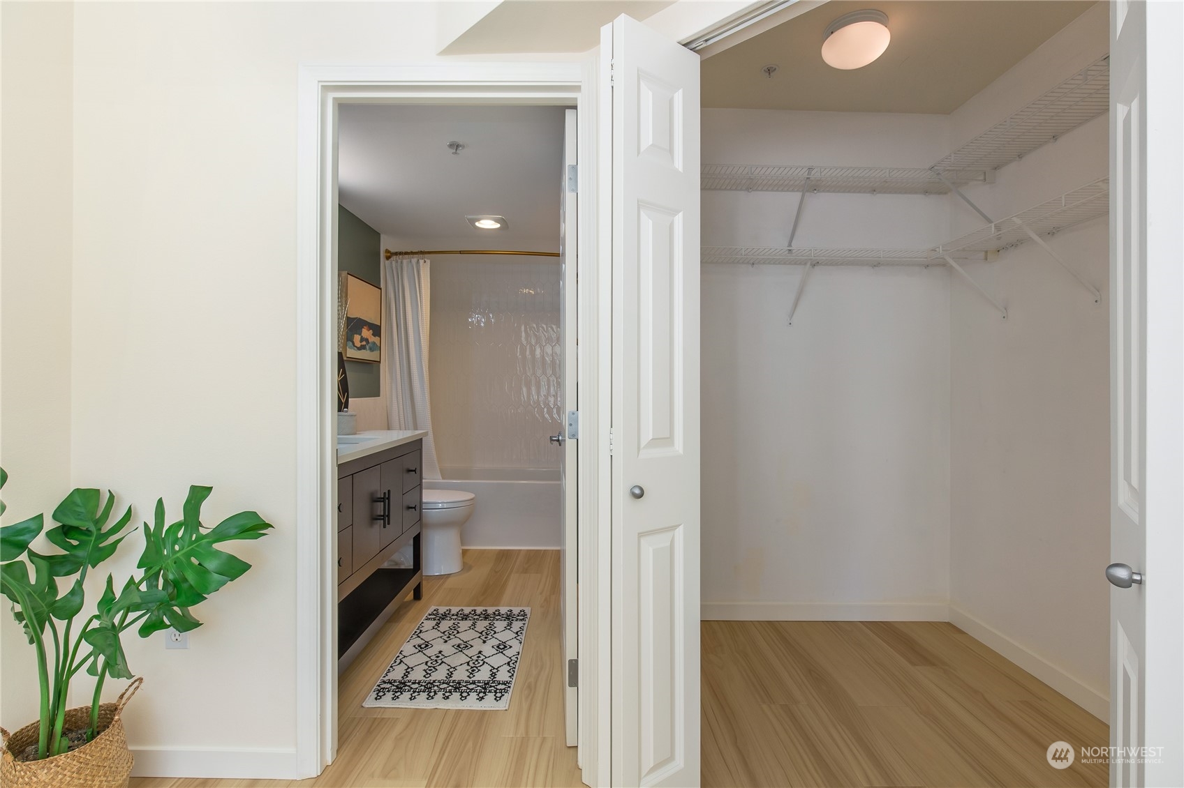 18 Dravus Street, Unit 210 Seattle, WA 98109 - Photo 11 of 38 a bathroom with a toilet and a shower