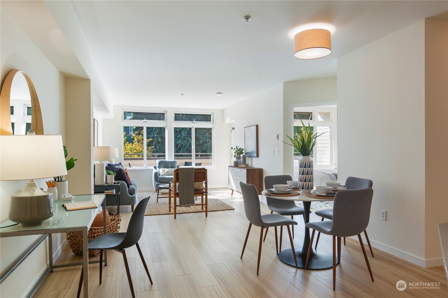 18 Dravus Street, Unit 210 Seattle, WA 98109 - Photo 13 of 38 a view of a dining room with furniture window and wooden floor