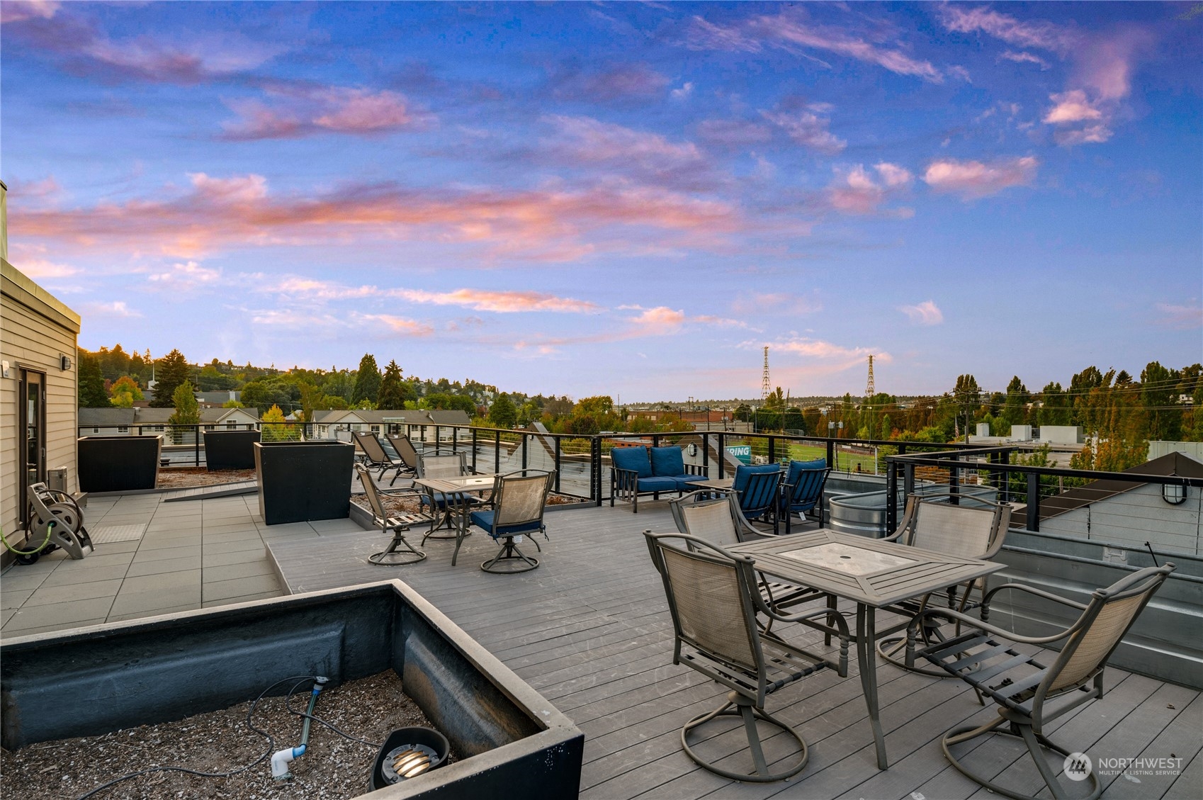 18 Dravus Street, Unit 210 Seattle, WA 98109 - Photo 31 of 38 a view of a terrace with seating area