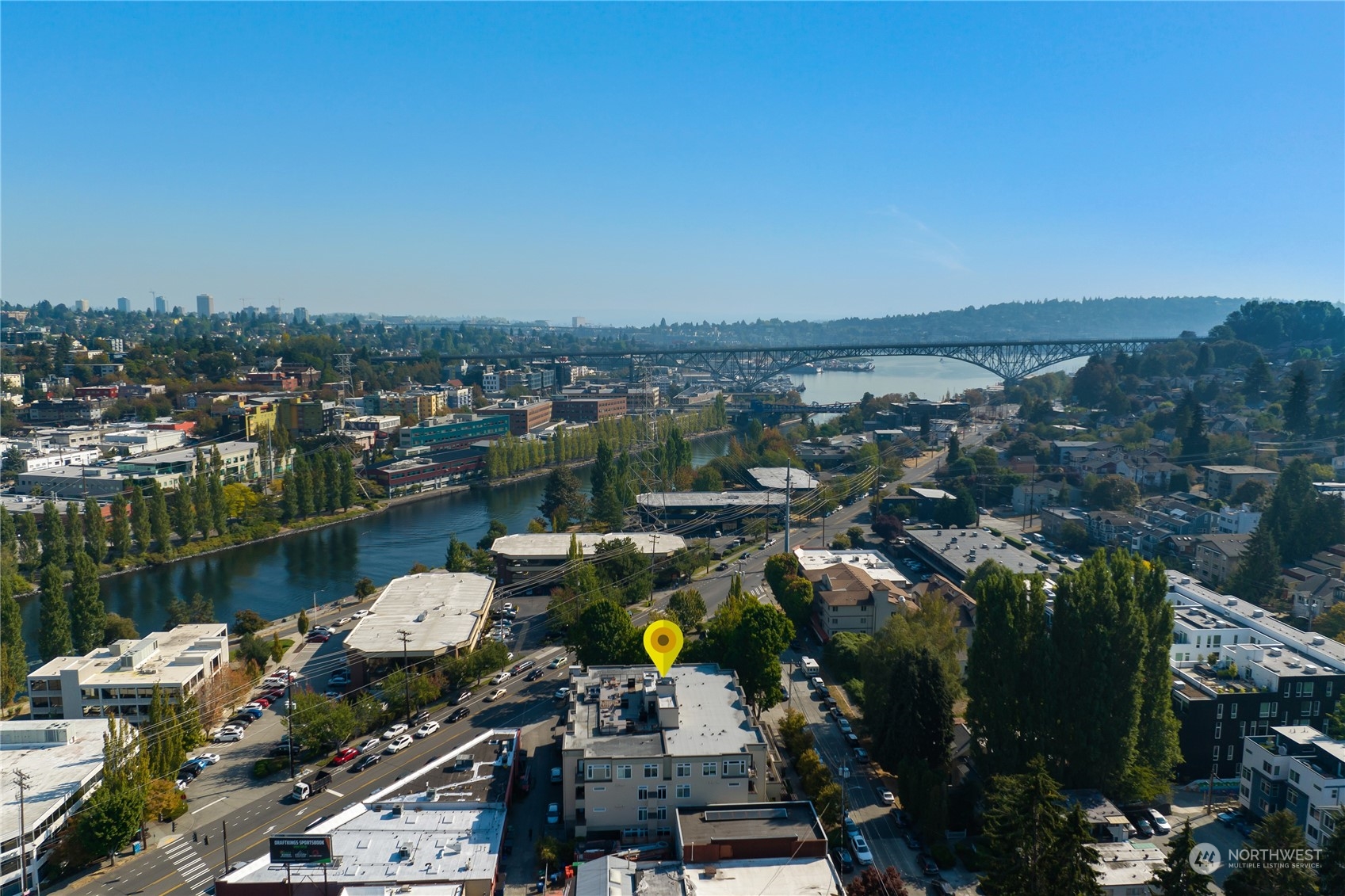 18 Dravus Street, Unit 210 Seattle, WA 98109 - Photo 34 of 38 a view of a lake with a city