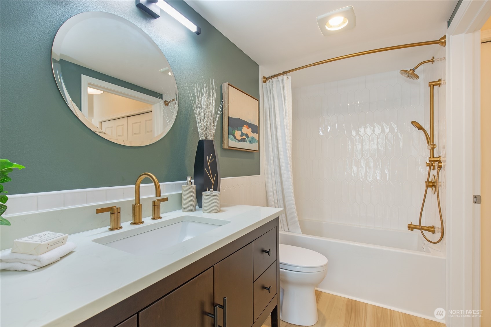 18 Dravus Street, Unit 210 Seattle, WA 98109 - Photo 9 of 38 a bathroom with a granite countertop sink toilet and shower