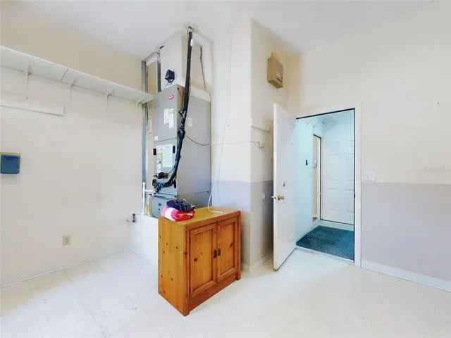 a view of a livingroom with furniture and furniture