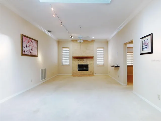 a large bathroom with a sink and a large mirror