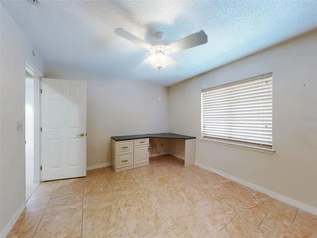 a view of a hallway with a white walls