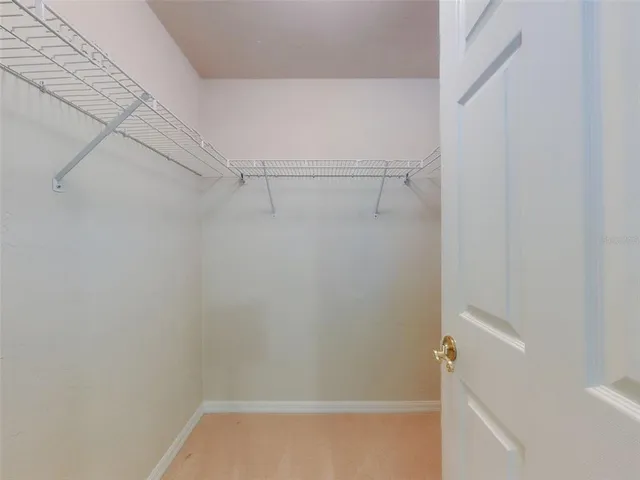 a front view of a house with swimming pool having outdoor seating