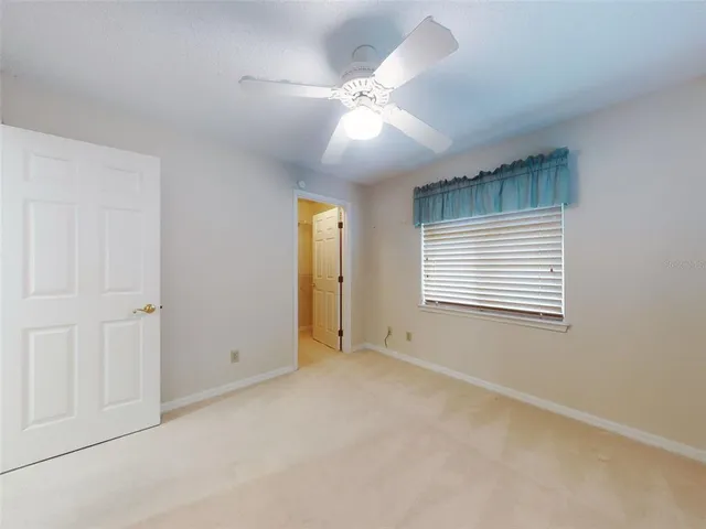 a view of a lake with a yard