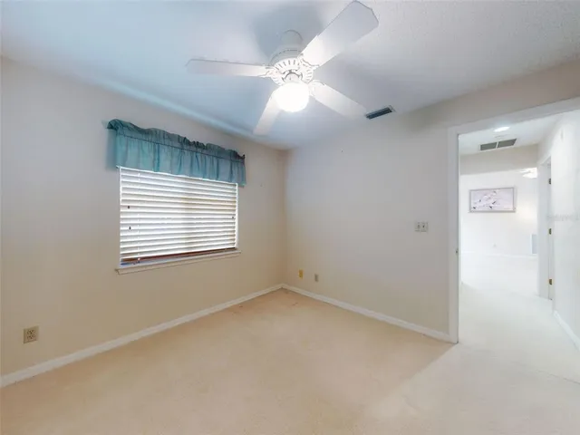 a view of a lake view with houses in back