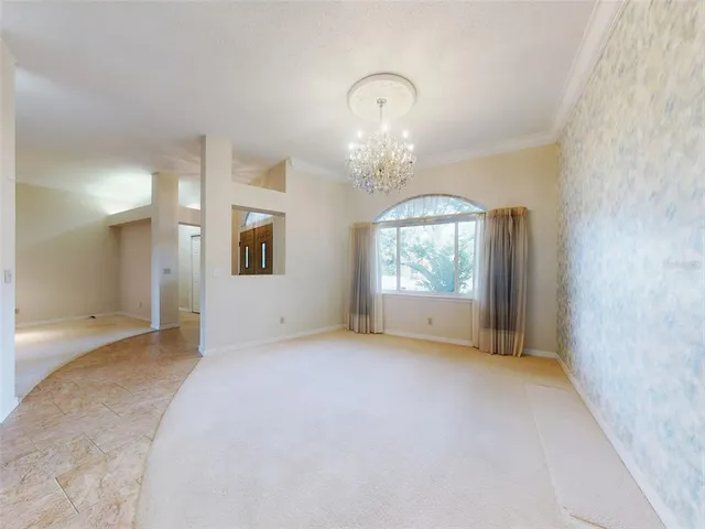 a kitchen with stainless steel appliances granite countertop a stove sink and microwave