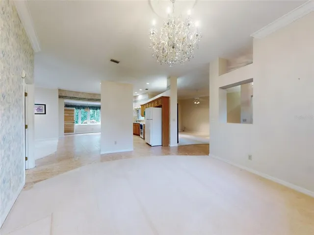 a large kitchen with stainless steel appliances lots of counter top space