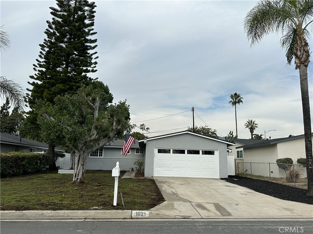 1021 Gaillard Street Azusa, CA 91702 - Photo 21 of 24 a front view of a house with garage
