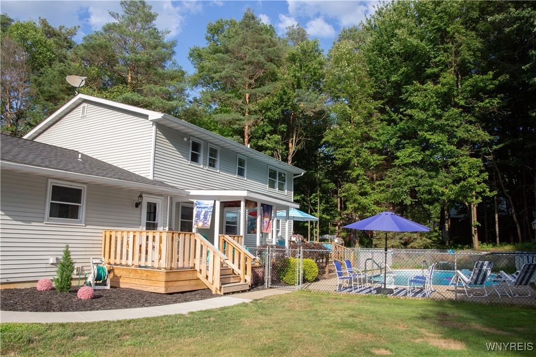 13431 Ward Road Holland, NY 14080 - Photo 11 of 50 Huge 10x45 ft deck including covered porch