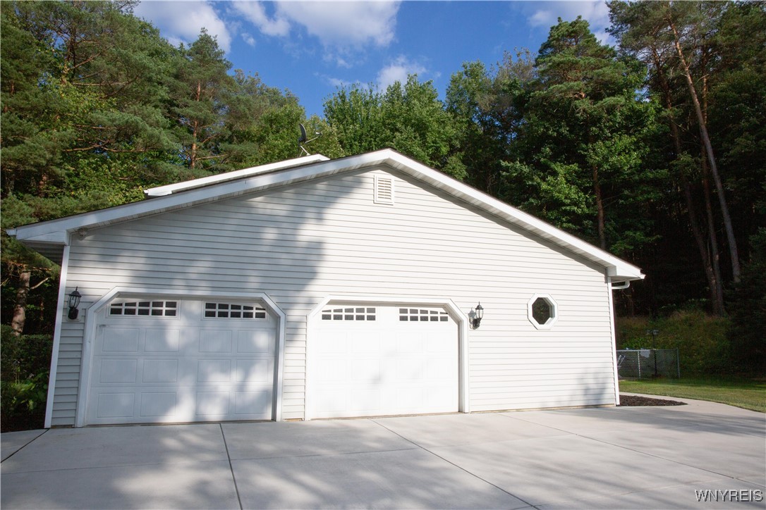 13431 Ward Road Holland, NY 14080 - Photo 9 of 50 2-1/2 car attached garage