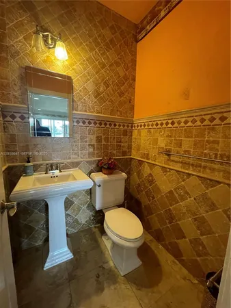a view of a bathroom with a sink and a toilet