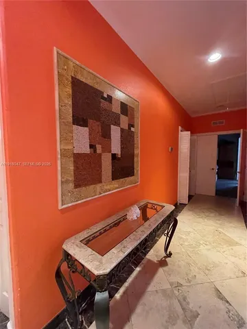 a patio with water table and chairs