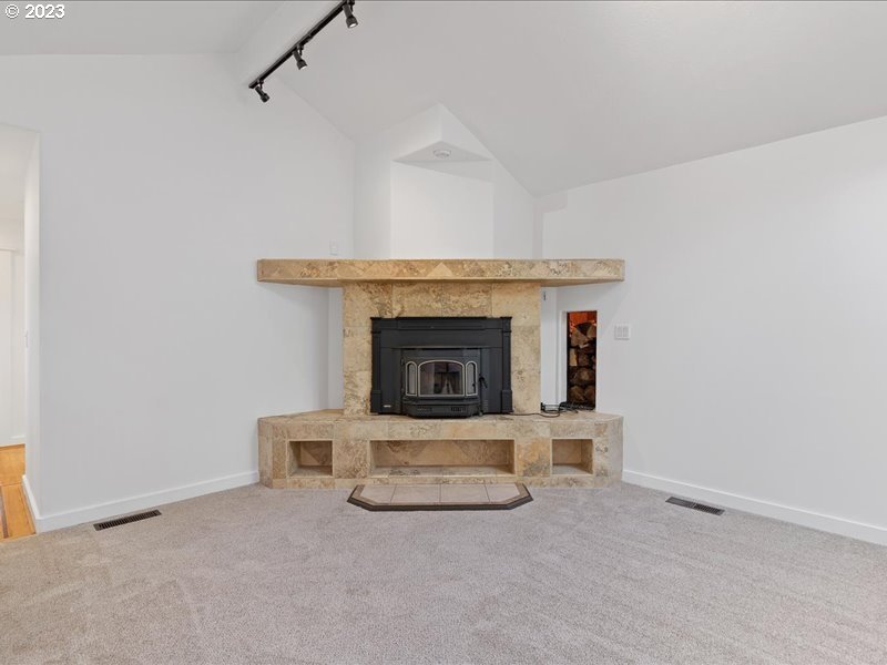 4155 Mapleton Drive West Linn, OR 97068 - Photo 18 of 38 a living room with a fireplace