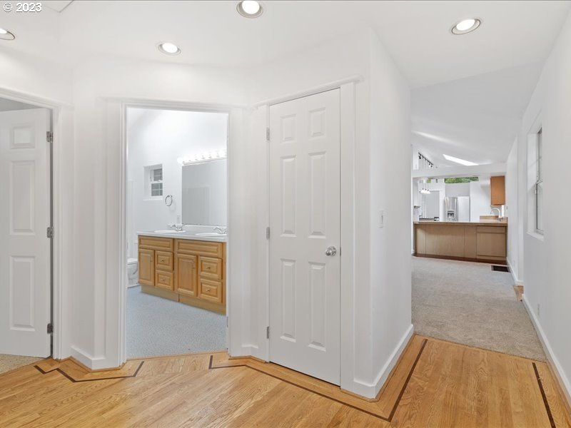 4155 Mapleton Drive West Linn, OR 97068 - Photo 20 of 38 a bedroom with a bed and a mirror