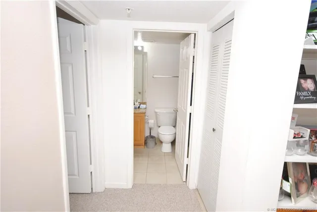 a view of a lake with a sitting area