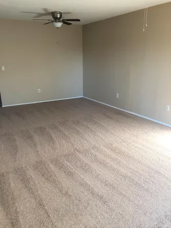 a view of a room with an empty space