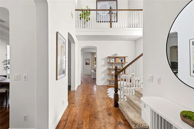 a living room with furniture potted plant and a fireplace