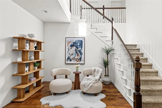 a spacious bedroom with a bed and couch