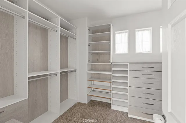 a empty closet with white paint