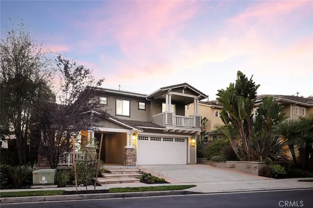 a living room with furniture fireplace and window