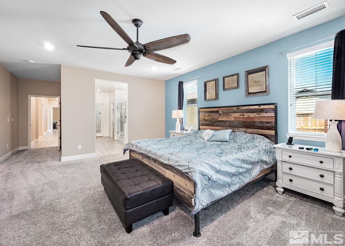 10310 Palladium Mine Drive Reno, NV 89521 - Photo 12 of 35 a bedroom with a bed a window and closet