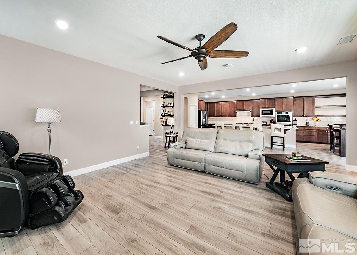 10310 Palladium Mine Drive Reno, NV 89521 - Photo 7 of 35 a living room with furniture and kitchen view