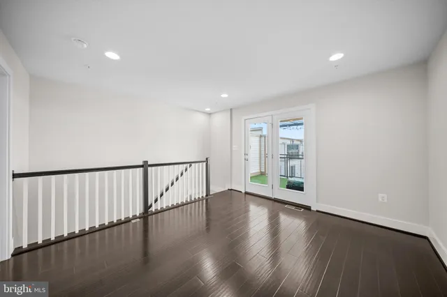 a view of entryway with wooden floor