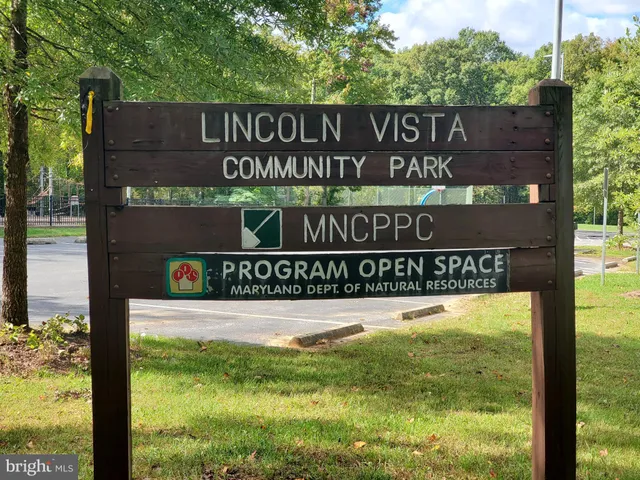 a backyard of a house with outdoor seating