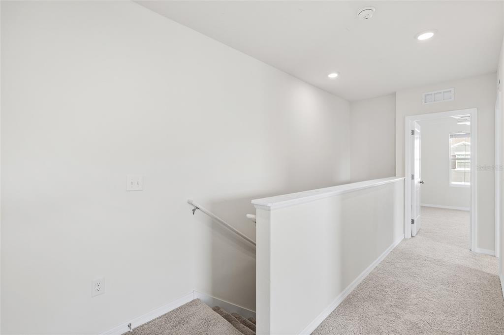 8502 Falling Blue Place Riverview, FL 33578 - Photo 12 of 32 a view of an empty room