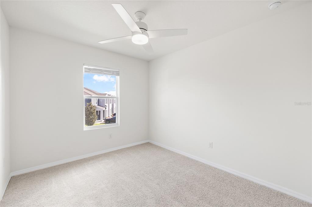8502 Falling Blue Place Riverview, FL 33578 - Photo 18 of 32 an empty room with a window