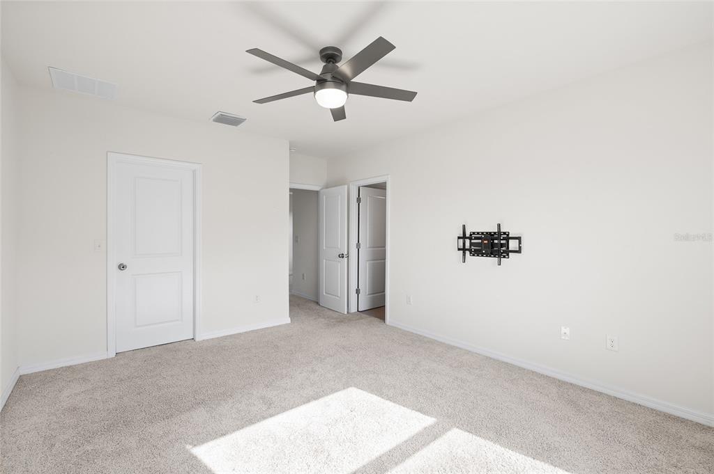 8502 Falling Blue Place Riverview, FL 33578 - Photo 21 of 32 a view of a livingroom with a ceiling fan