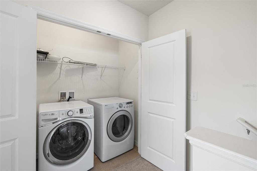 8502 Falling Blue Place Riverview, FL 33578 - Photo 23 of 32 a utility room with dryer and washer