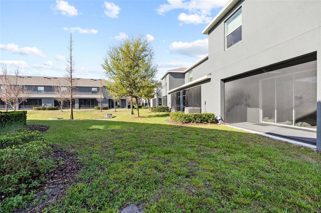 8502 Falling Blue Place Riverview, FL 33578 - Photo 26 of 32 a view of a house with a yard and sitting area