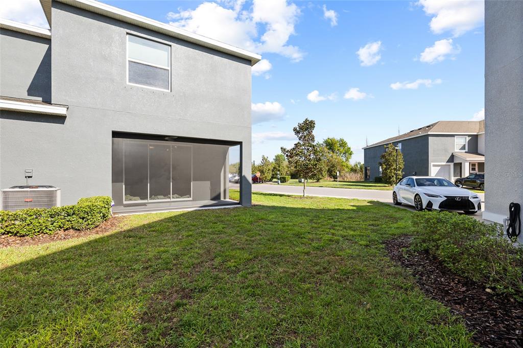 8502 Falling Blue Place Riverview, FL 33578 - Photo 27 of 32 a view of a house with backyard and garden