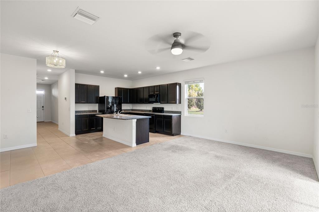 8502 Falling Blue Place Riverview, FL 33578 - Photo 9 of 32 a view of kitchen with a sink and stainless steel appliances