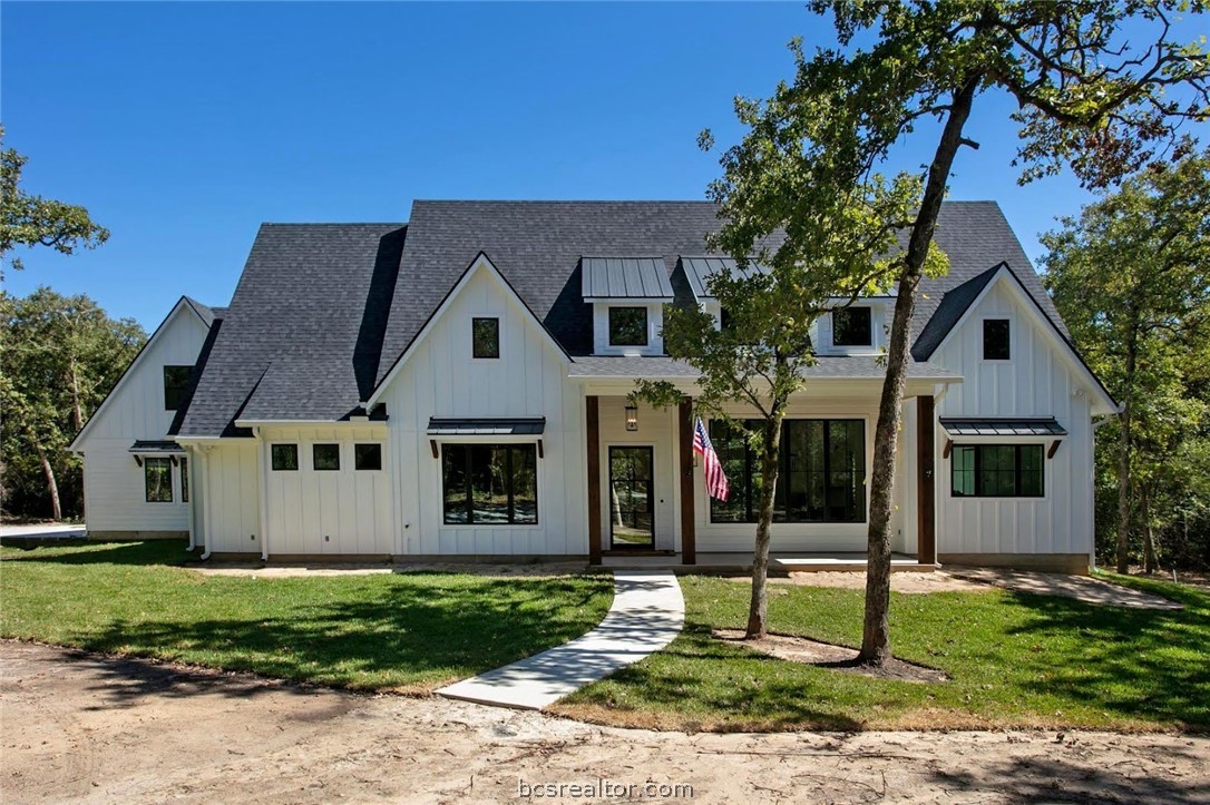 1629 Sawmill Road Franklin, TX 77856 - Photo 1 of 47 a front view of a house with a yard