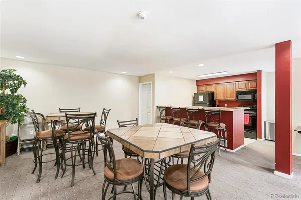 a table and chairs in a room