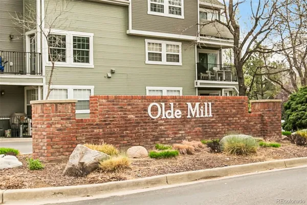 a view of a brick house with a street