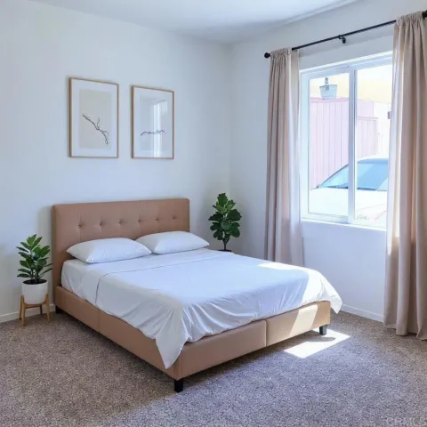 a living room with furniture and a lamp