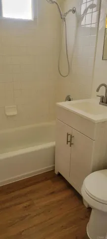 a view of a room with wooden walls