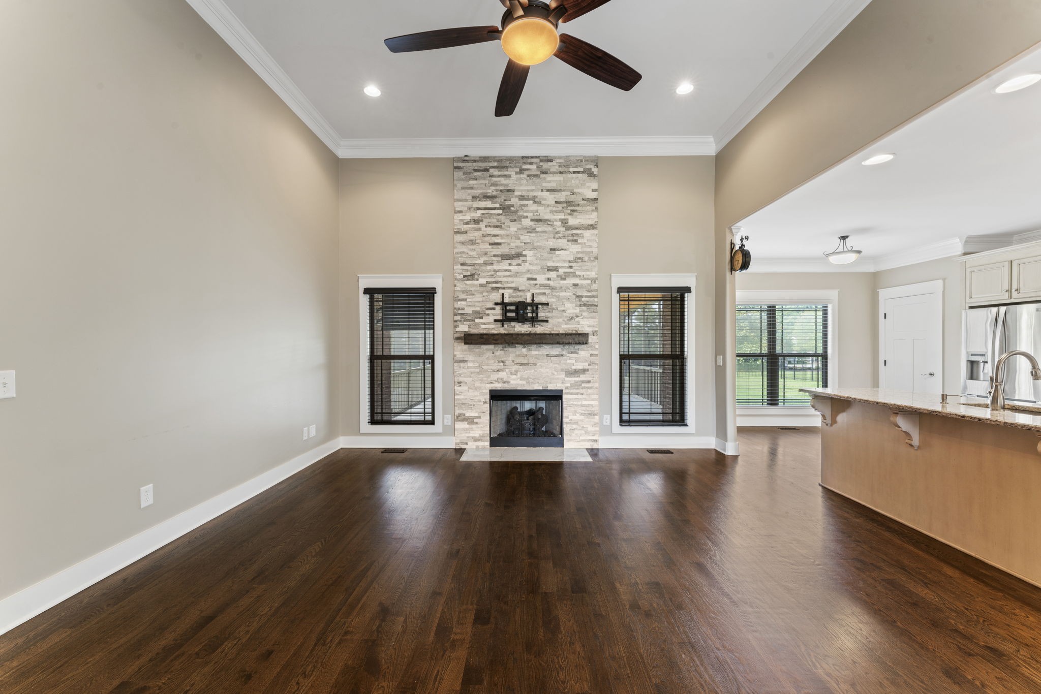 523 Urlacher Drive Murfreesboro, TN 37129 - Photo 11 of 45 a view of a big room with wooden floor a fireplace and a window