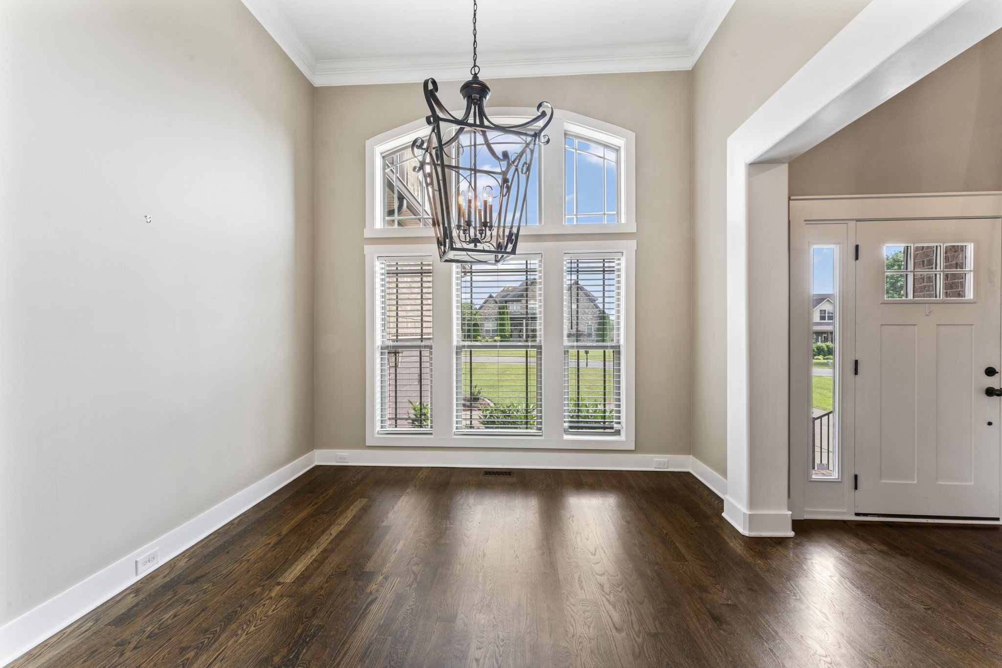 523 Urlacher Drive Murfreesboro, TN 37129 - Photo 5 of 45 a view of an empty room with wooden floor and a window