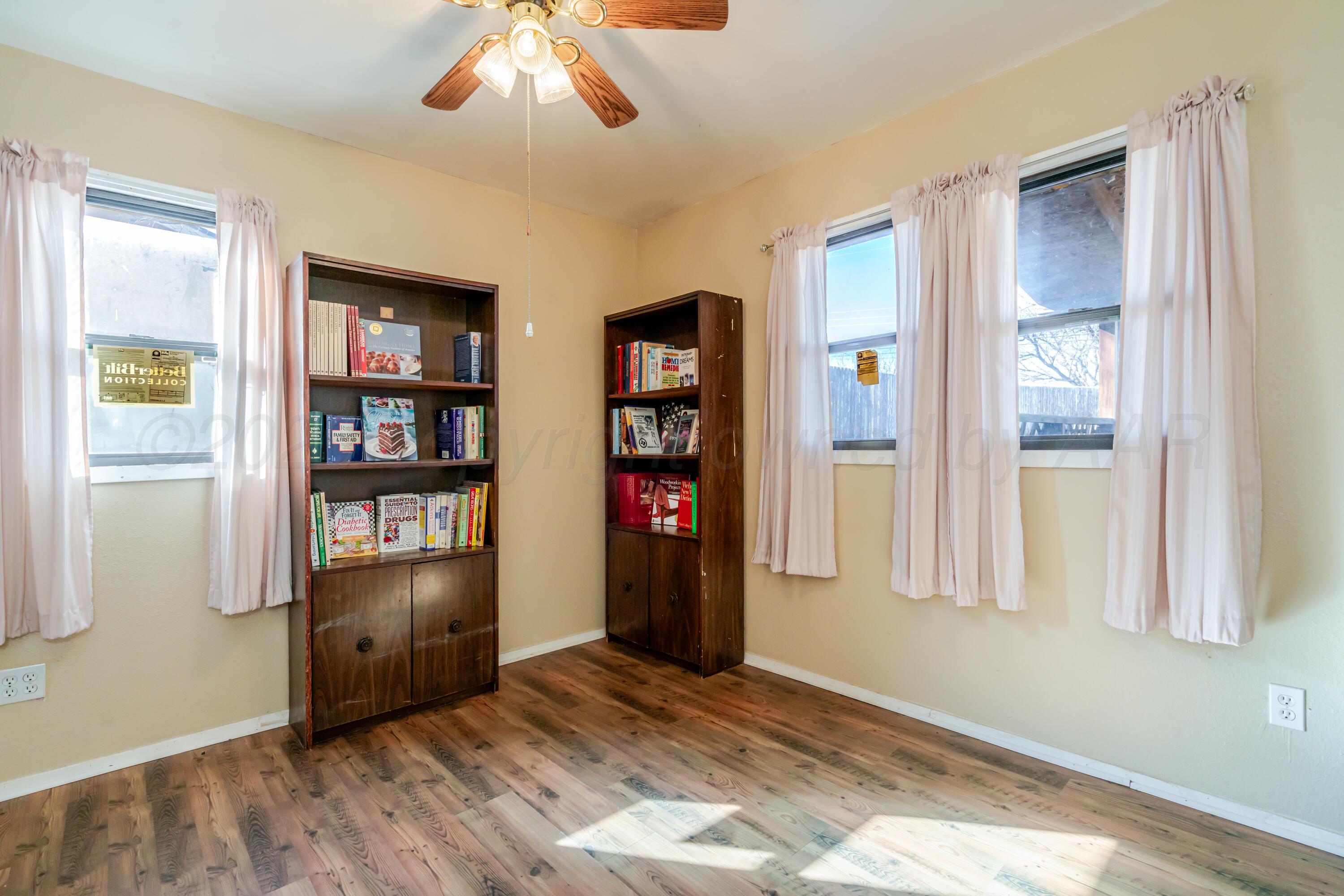 2805 Palm Street Amarillo, TX 79107 - Photo 14 of 17 a view of an empty room with window and cabinet