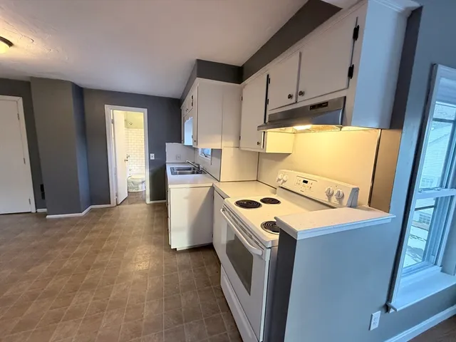 a view of kitchen and washer and dryer