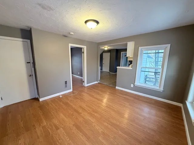 a view of an empty room and window